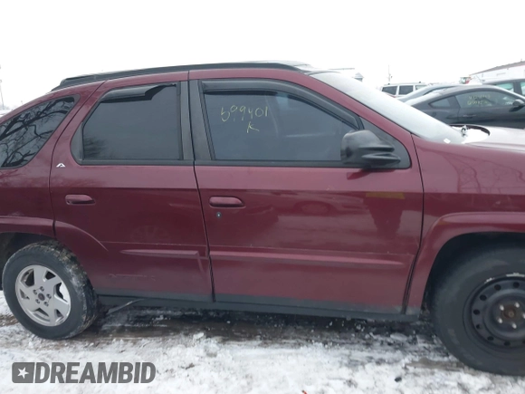 2002 Pontiac Aztek z VIN 3G7DA03E72S599401, wystawiony jako IAAI lot #41248586 z przebiegiem 135 971 mil mil oraz . Historia ofert i sprzedaży dostępna na DreamBid. Obrazek 13.
