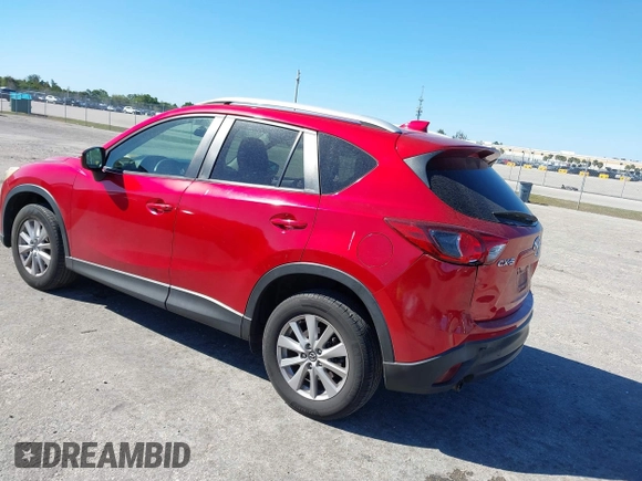 2015 Mazda CX-5 Touring with VIN JM3KE2CY5F0542184, listed as a IAAI auction lot 41770264 with 119,592 mi miles. Bid and sale history available at carsss.com. Image 3.