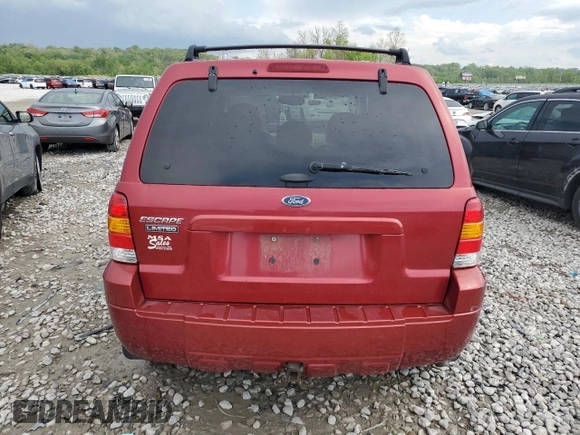 2005 Ford Escape Limited with VIN 1FMYU04165KA33277, listed as a Copart auction lot 54407625 with 217,317 mi miles and Salvage title. Bid and sale history available at DreamBid. Image 6.