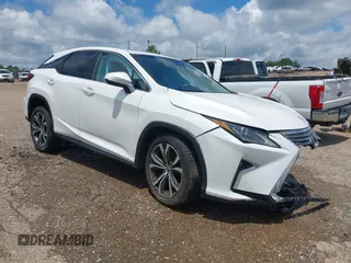 2019 Lexus RX 350 z VIN 2T2ZZMCA8KC142609, wystawiony jako IAAI lot #42230449 z przebiegiem 61 272 mil mil oraz . Historia ofert i sprzedaży dostępna na DreamBid. Obrazek 1.