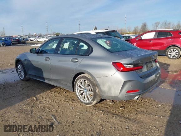 2023 BMW 3 Series 330e xDrive with VIN 3MW39FS01P8C81368, listed as a IAAI auction lot 41859161 with 72,648 mi miles. Bid and sale history available at carsss.com. Image 3.