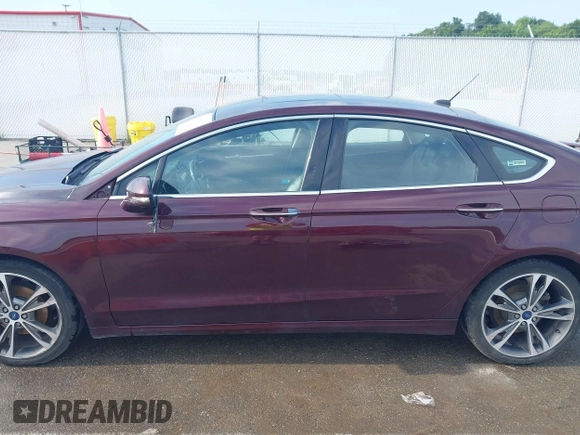 2017 Ford Fusion Titanium z VIN 3FA6P0K94HR271307, wystawiony jako IAAI lot #42595411 z przebiegiem 100 344 mil mil oraz . Historia ofert i sprzedaży dostępna na DreamBid. Obrazek 15.