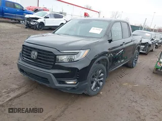2022 Honda Ridgeline Sport with VIN 5FPYK3F15NB010408, listed as a IAAI auction lot 41538181 with 87,923 mi miles and . Bid and sale history available at DreamBid. Image 2.