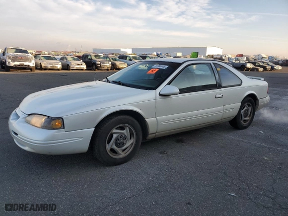 1996 Ford Thunderbird LX with VIN 1FALP62W0TH162431, listed as a Copart auction lot 41864445 with 183,798 mi miles and Salvage Title. Bid and sale history available at carsss.com. Image 1.