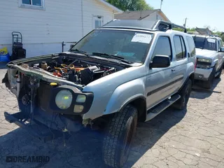 2003 Nissan Xterra XE with VIN 5N1ED28T03C702175, listed as a IAAI auction lot 41994272 with 180,242 mi miles. Bid and sale history available at carsss.com. Image 2.