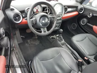 2012 MINI Convertible with VIN WMWZN3C58CT134224, listed as a Copart auction lot 57610015 with 141,394 mi miles and Salvage title. Bid and sale history available at DreamBid. Image 8.