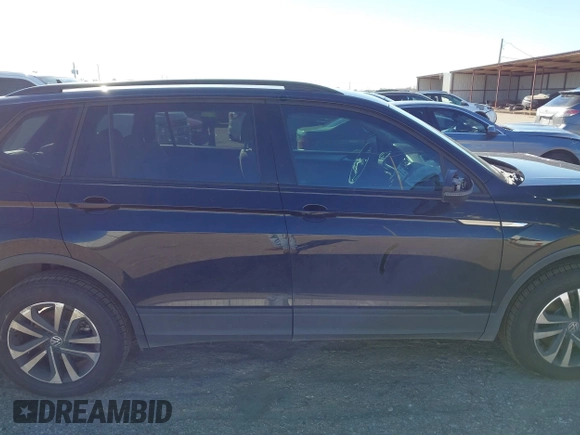 2022 Volkswagen Tiguan S with VIN 3VV1B7AX7NM107779, listed as a IAAI auction lot 41210258 with 57,154 mi miles and . Bid and sale history available at DreamBid. Image 14.