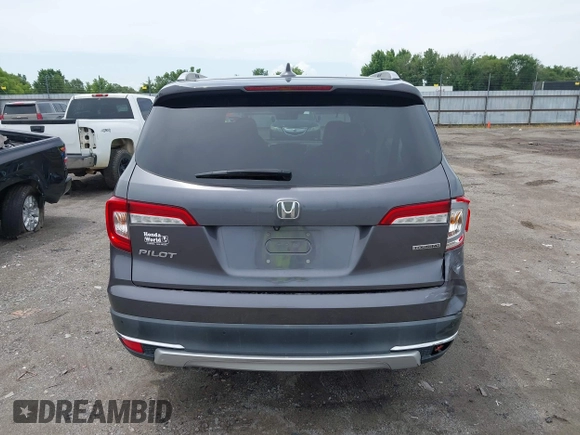 2019 Honda Pilot Touring 8-Passenger with VIN 5FNYF5H93KB028641, listed as a IAAI auction lot 42524078 with 56,744 mi miles and . Bid and sale history available at DreamBid. Image 17.