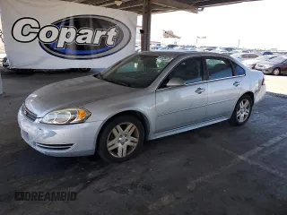 2015 Chevrolet Impala LT with VIN 2G1WB5E34F1163311, listed as a Copart auction lot 64336575 with 118,336 mi miles and Salvage title. Bid and sale history available at DreamBid. Image 1.