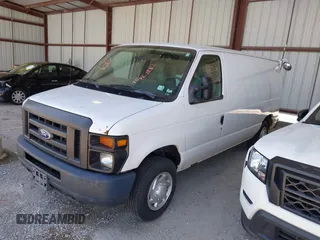 2014 Ford Econoline Cargo Commercial with VIN 1FTNE1EL7EDB06431, listed as a IAAI auction lot 42028232 with 175,707 mi miles. Bid and sale history available at carsss.com. Image 14.
