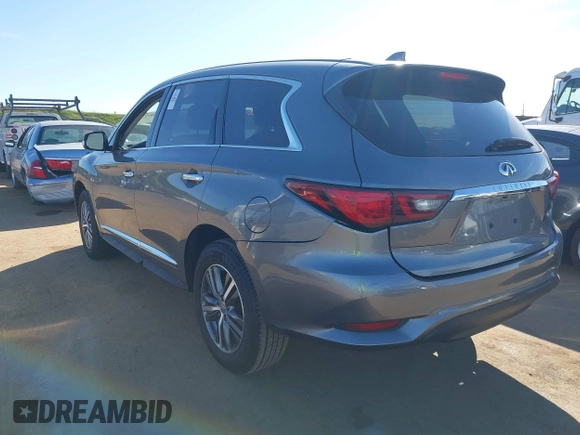 2020 Infiniti QX60 Luxe with VIN 5N1DL0MN5LC520126, listed as a IAAI auction lot 41698233 with 75,249 mi miles and . Bid and sale history available at DreamBid. Image 3.