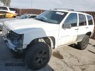 1998 Jeep Grand Cherokee Laredo with VIN 1J4GZ58S6WC319444, listed as a Copart auction lot 53147665 with 217,068 mi miles and Salvage Title. Bid and sale history available at carsss.com. Image 1.