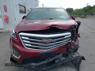 2017 Cadillac XT5 Luxury FWD z VIN 1GYKNBRS1HZ200882, wystawiony jako IAAI lot #42181291 z przebiegiem 95 687 mil mil oraz . Historia ofert i sprzedaży dostępna na DreamBid. Obrazek 12.