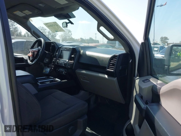2019 Ford F-150 XL with VIN 1FTEW1EP1KKD58344, listed as a IAAI auction lot 42574848 with 54,133 mi miles and . Bid and sale history available at DreamBid. Image 5.