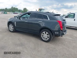 2014 Cadillac SRX Luxury Collection z VIN 3GYFNEE38ES626949, wystawiony jako IAAI lot #42194679 z przebiegiem 173 303 mil mil oraz . Historia ofert i sprzedaży dostępna na DreamBid. Obrazek 3.