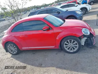 2018 Volkswagen Beetle S with VIN 3VWFD7AT5JM725878, listed as a IAAI auction lot 41743855 with 108,068 mi miles. Bid and sale history available at carsss.com. Image 13.