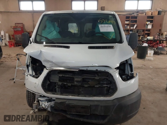 2016 Ford Transit Cargo z VIN 1FTYE1YM1GKB30742, wystawiony jako IAAI lot #41357645 z przebiegiem 240 747 mil mil oraz . Historia ofert i sprzedaży dostępna na DreamBid. Obrazek 13.
