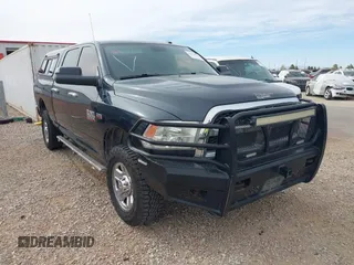 2014 Ram 2500 Tradesman z VIN 3C6TR5CT8EG267161, wystawiony jako IAAI lot #41874971 z przebiegiem 264 760 mil mil oraz . Historia ofert i sprzedaży dostępna na DreamBid. Obrazek 1.