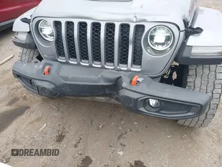 2021 Jeep Gladiator Mojave with VIN 1C6JJTEG9ML519309, listed as a IAAI auction lot 41701544 with 64,461 mi miles and . Bid and sale history available at DreamBid. Image 6.