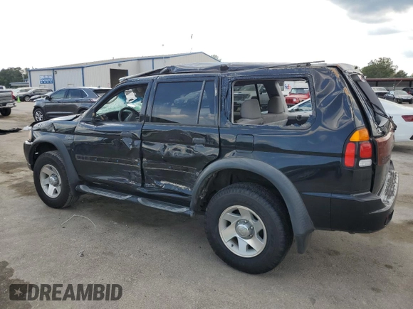 2002 Mitsubishi Montero ES z VIN JA4LS21H02J022594, wystawiony jako Copart lot #72750954 z przebiegiem 122 232 mil mil oraz Szkody całkowita. Historia ofert i sprzedaży dostępna na DreamBid. Obrazek 2.