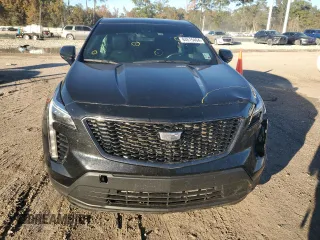 2021 Cadillac XT4 FWD Luxury с VIN 1GYAZAR4XMF066381, выставлен на аукционе Copart как лот 84615464 с пробегом 80 018 миль миль и Списание • Salvage title. История ставок и продаж доступна на DreamBid. Изображение 5.