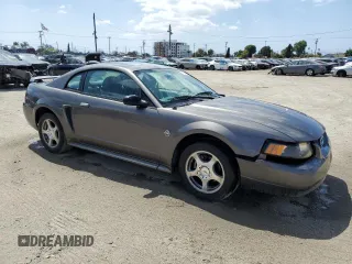 2004 Ford Mustang Standard with VIN 1FAFP406X4F141264, listed as a Copart auction lot 51853425 with 192,164 mi miles and Salvage Title. Bid and sale history available at carsss.com. Image 4.