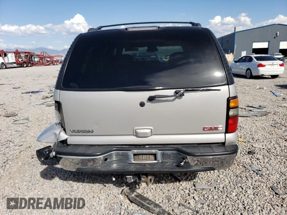 2004 GMC Yukon SLT with VIN 1GKEK13Z04J140148, listed as a Copart auction lot 52411494 with 167,629 mi miles and Salvage Title. Bid and sale history available at carsss.com. Image 6.