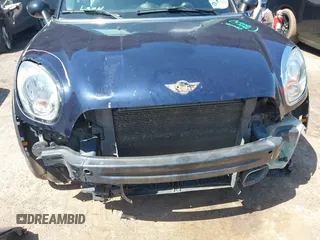 2014 MINI Countryman S with VIN WMWZC3C5XEWP27221, listed as a IAAI auction lot 41957817 with 112,353 mi miles and . Bid and sale history available at DreamBid. Image 6.