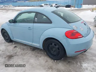 2012 Volkswagen Beetle 2.5L PZEV with VIN 3VWJP7AT7CM605780, listed as a IAAI auction lot 41142616 with 177,768 mi miles. Bid and sale history available at carsss.com. Image 3.
