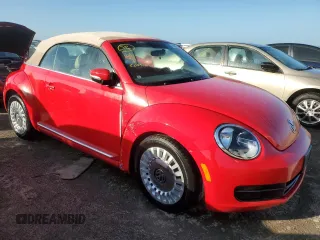 2014 Volkswagen Beetle 1.8T w/Premium z VIN 3VW517AT9EM819966, wystawiony jako Copart lot #76990014 z przebiegiem Nie podano mil oraz Nie do naprawy • Non repairable. Historia ofert i sprzedaży dostępna na DreamBid. Obrazek 4.