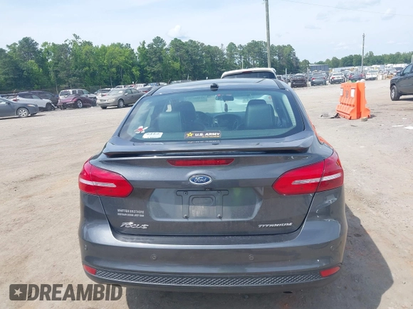 2017 Ford Focus Titanium with VIN 1FADP3J27HL306546, listed as a IAAI auction lot 42480576 with 114,285 mi miles and . Bid and sale history available at DreamBid. Image 17.