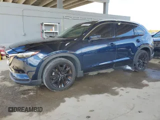 2022 Mazda CX-9 Touring Plus with VIN JM3TCBAYXN0607056, listed as a Copart auction lot 61740065 with 59,281 mi miles and Salvage title. Bid and sale history available at DreamBid. Image 1.