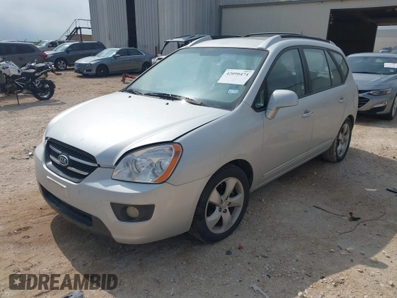 2007 Kia Rondo LX with VIN KNAFG526077069189, listed as a IAAI auction lot 42090474 with 96,722 mi miles. Bid and sale history available at carsss.com. Image 2.
