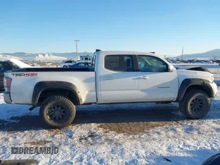 2021 Toyota Tacoma 4WD SR5 with VIN 3TMDZ5BN6MM105593, listed as a IAAI auction lot 41424096 with 39,215 mi miles. Bid and sale history available at carsss.com. Image 14.