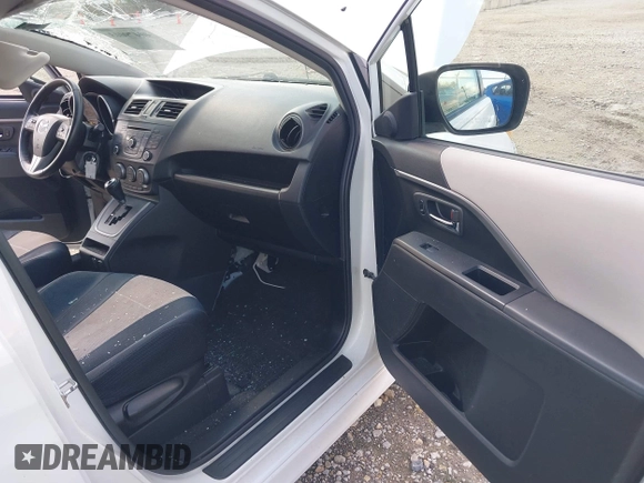 2013 Mazda 5 Touring with VIN JM1CW2CLXD0151396, listed as a IAAI auction lot 40479013 with 118,314 mi miles and . Bid and sale history available at DreamBid. Image 5.