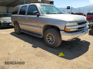 2003 Chevrolet Tahoe LT with VIN 1GNEC13ZX3R111532, listed as a Copart auction lot 63007715 with 259,010 mi miles and Salvage title. Bid and sale history available at DreamBid. Image 4.