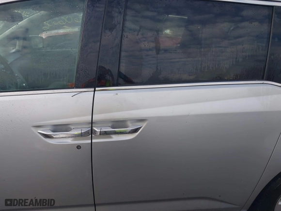 2013 Honda Odyssey Touring with VIN 5FNRL5H97DB021403, listed as a IAAI auction lot 41606606 with 223,547 mi miles. Bid and sale history available at carsss.com. Image 14.