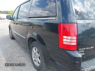 2010 Chrysler Town & Country Touring with VIN 2A4RR5DX5AR329523, listed as a IAAI auction lot 41941874 with 207,079 mi miles. Bid and sale history available at carsss.com. Image 12.