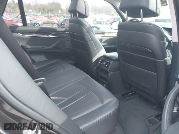 2014 BMW X5 xDrive35i with VIN 5UXKR0C57E0H20944, listed as a IAAI auction lot 42011451 with 208,205 mi miles. Bid and sale history available at carsss.com. Image 8.