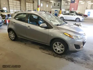 2013 Mazda Mazda2 Sport with VIN JM1DE1KY4D0170766, listed as a Copart auction lot 68338244 with 114,165 mi miles and Salvage Title. Bid and sale history available at carsss.com. Image 4.