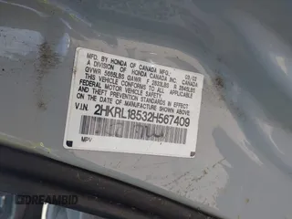 2002 Honda Odyssey LX z VIN 2HKRL18532H567409, wystawiony jako IAAI lot #42069502 z przebiegiem 173 662 mil mil oraz . Historia ofert i sprzedaży dostępna na DreamBid. Obrazek 9.