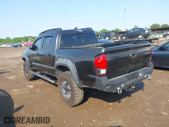 2017 Toyota Tacoma SR5 with VIN 3TMCZ5ANXHM099610, listed as a IAAI auction lot 42441050 with 85,046 mi miles and . Bid and sale history available at DreamBid. Image 3.