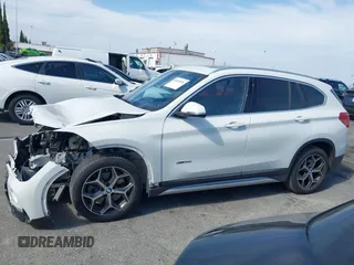 2018 BMW X1 xDrive28i with VIN WBXHT3C37J5K28375, listed as a IAAI auction lot 42039336 with 28,664 mi miles. Bid and sale history available at carsss.com. Image 14.