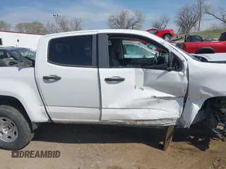 2019 Chevrolet Colorado 2WD Work Truck with VIN 1GCGSBEA7K1302243, listed as a IAAI auction lot 42049966 with 104,209 mi miles and . Bid and sale history available at DreamBid. Image 12.