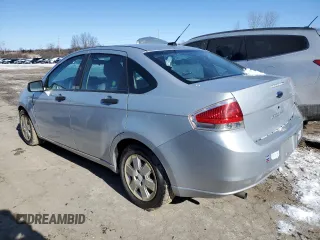 2008 Ford Focus S with VIN 1FAHP34N88W142973, listed as a Copart auction lot 44119005 with 199,115 mi miles and Salvage Title. Bid and sale history available at carsss.com. Image 2.