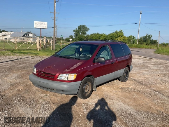 1999 Toyota Sienna LE with VIN 4T3ZF13C5XU141279, listed as a Copart auction lot 64366315 with 218,223 mi miles and Clean title. Bid and sale history available at DreamBid. Image 2.