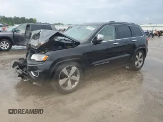 2015 Jeep Grand Cherokee Overland z VIN 1C4RJFCG7FC845127, wystawiony jako Copart lot #53978885 z przebiegiem 184 269 mil mil oraz Szkoda całkowita • Salvage title. Historia ofert i sprzedaży dostępna na DreamBid. Obrazek 1.