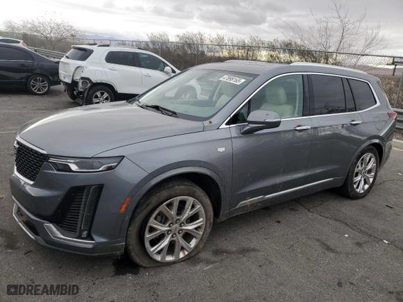 2020 Cadillac XT6 FWD Premium Luxury with VIN 1GYKPCRS5LZ201302, listed as a Copart auction lot 47898165 with 61,527 mi miles and Salvage Title. Bid and sale history available at carsss.com. Image 1.