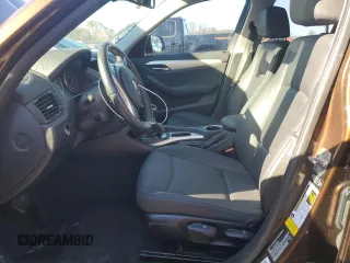2015 BMW X1 sDrive28i with VIN WBAVM1C54FV316825, listed as a Copart auction lot 83592644 with 76,823 mi miles and Salvage Title. Bid and sale history available at carsss.com. Image 7.