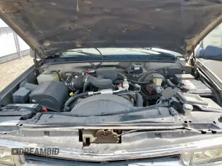 1999 Chevrolet Suburban z VIN 3GNFK16R2XG191868, wystawiony jako Copart lot #57620165 z przebiegiem 128 526 mil mil oraz Szkoda całkowita • Salvage title. Historia ofert i sprzedaży dostępna na DreamBid. Obrazek 12.